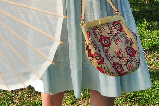 parasol umbrella and vintage needlepoint bag